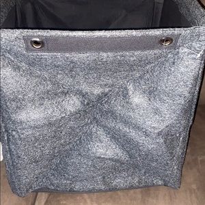 Thirty-one felt square storage bin